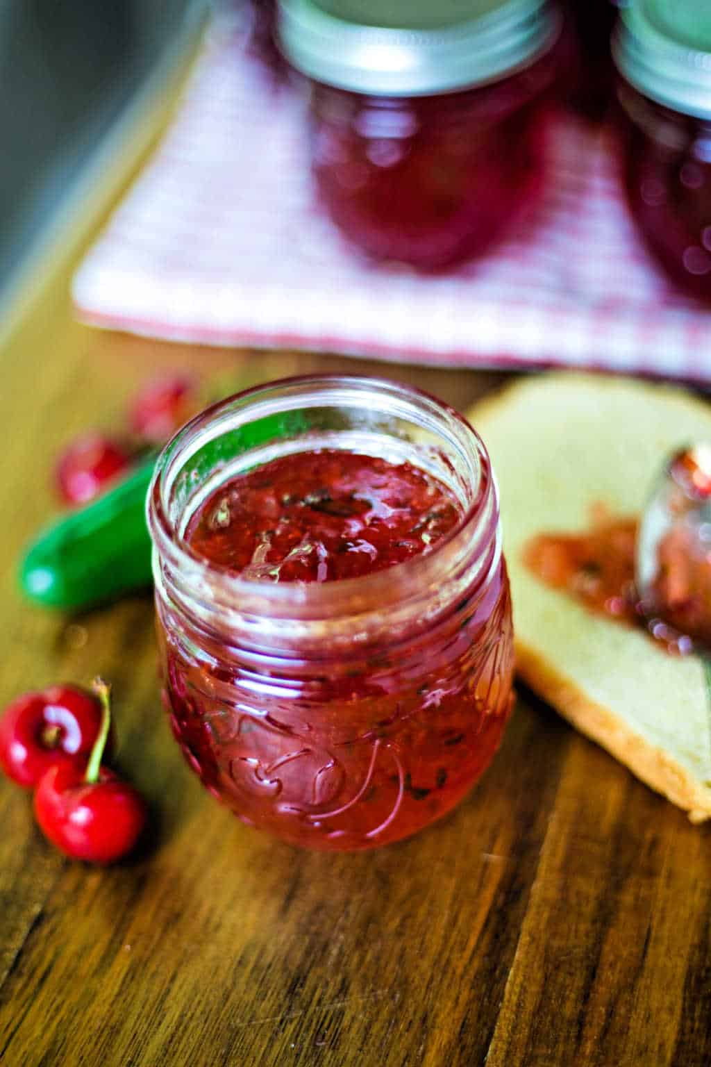 an open jar of hot cherry pepper jelly
