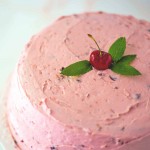 fresh cherry cake with fresh mint and buttercream frosting