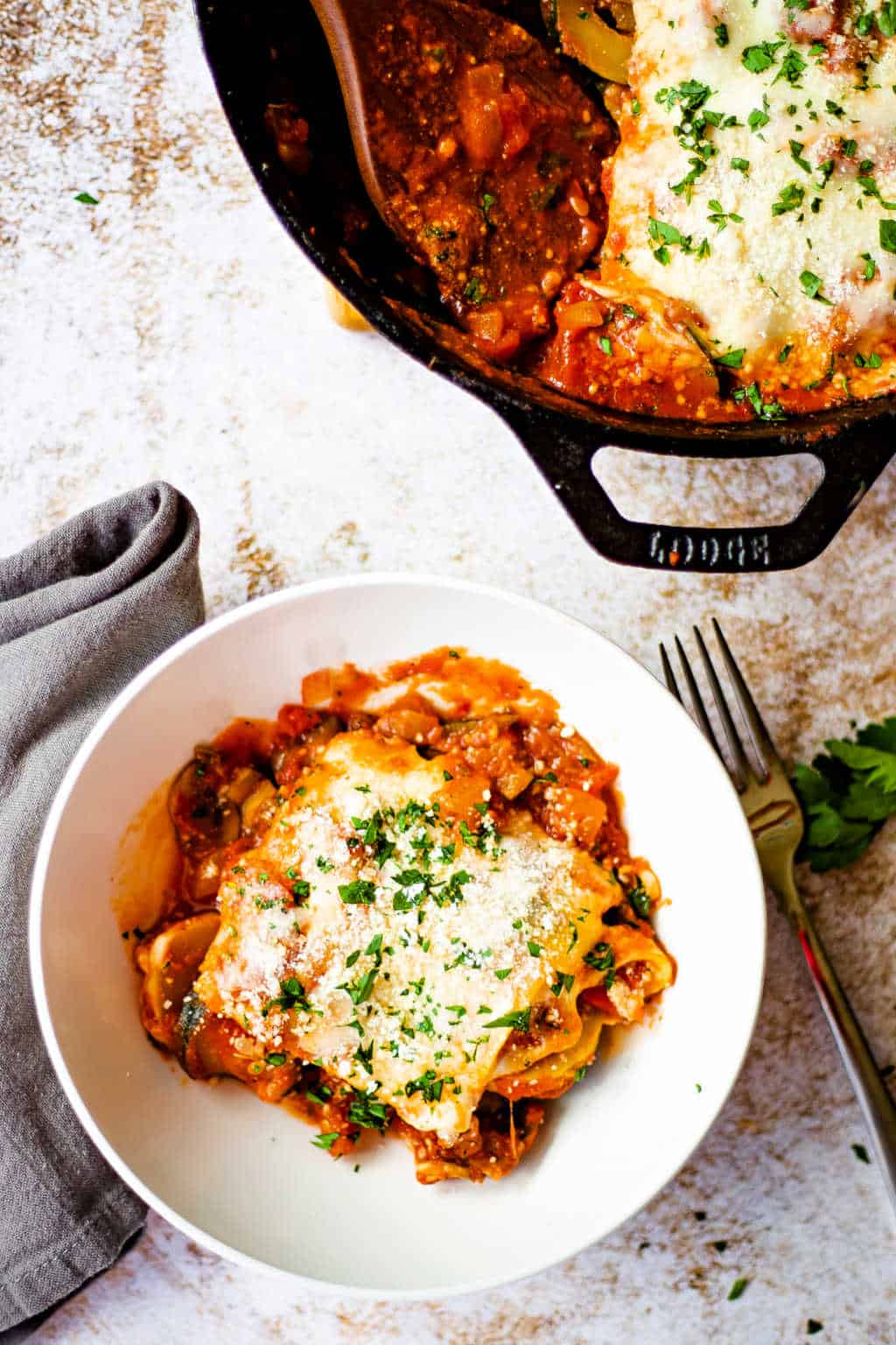 Skillet Lasagna with Squash and Mushrooms in a white bowl