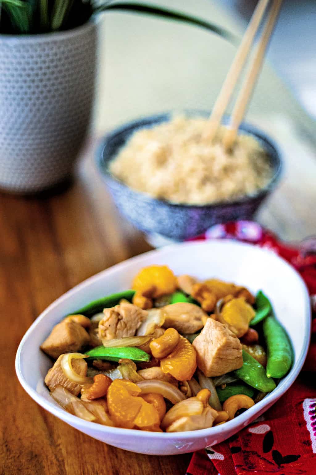 Easy Orange Cashew Chicken with a bowl of rice