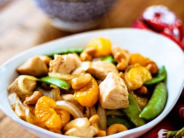 Easy Orange Cashew Chicken with a bowl of rice