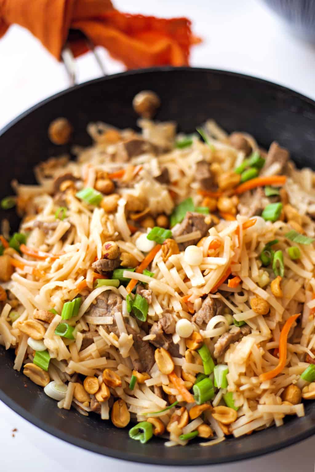 beef pad thai in a wok