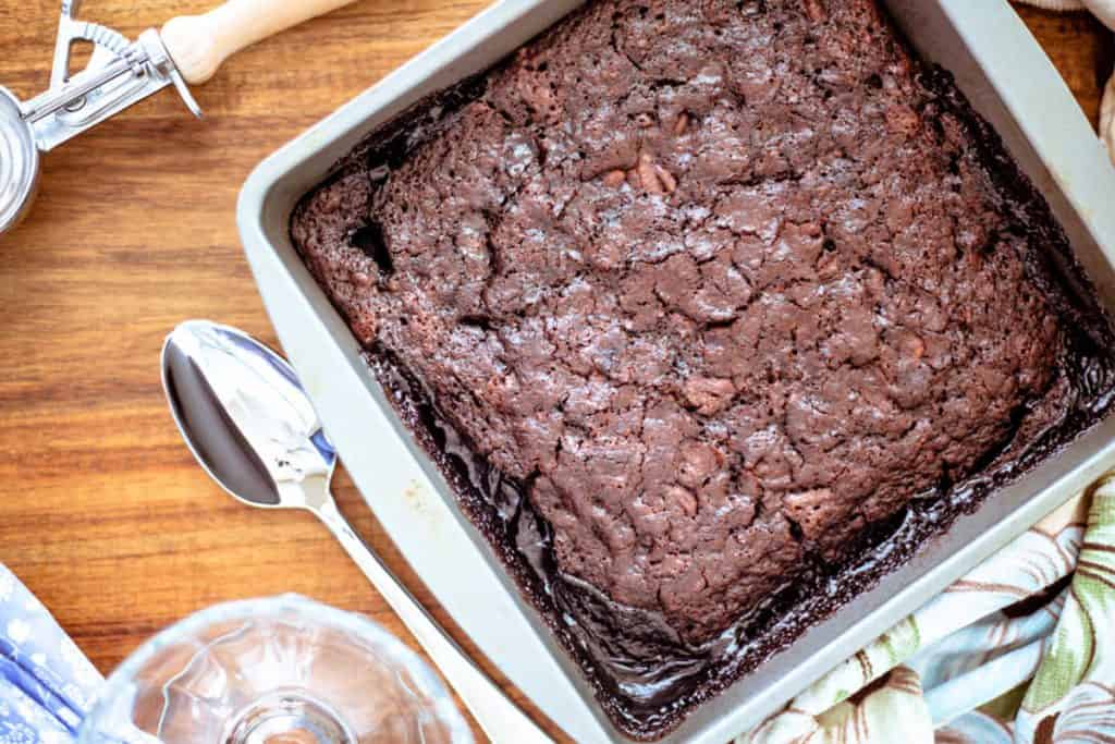 A chocolate pudding cake sitting on top of a wooden table