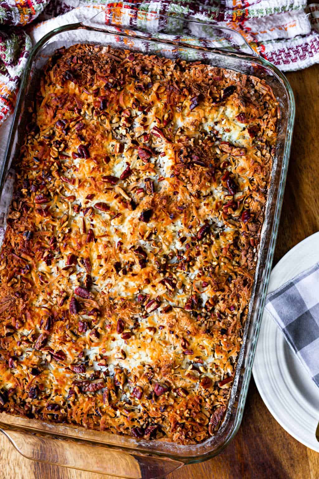 uncut german chocolate pumpkin dump cake in a glass baking dish