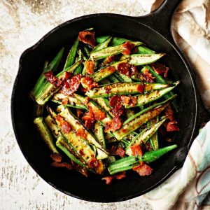 roasted okra in a cast iron skillet
