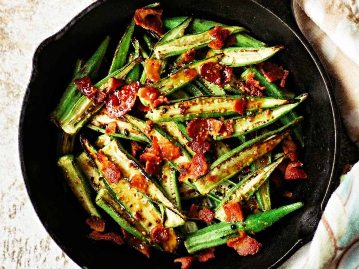 roasted okra in a cast iron skillet