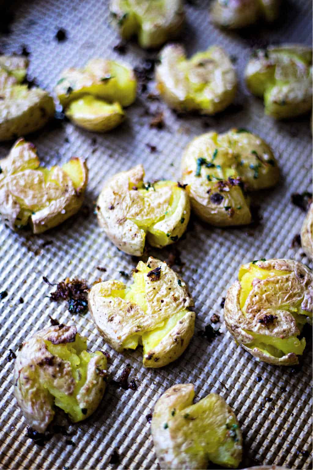 Lemon Garlic Smashed Potatoes on a baking sheet