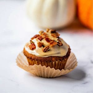 maple glazed bacon muffin in a paper liner