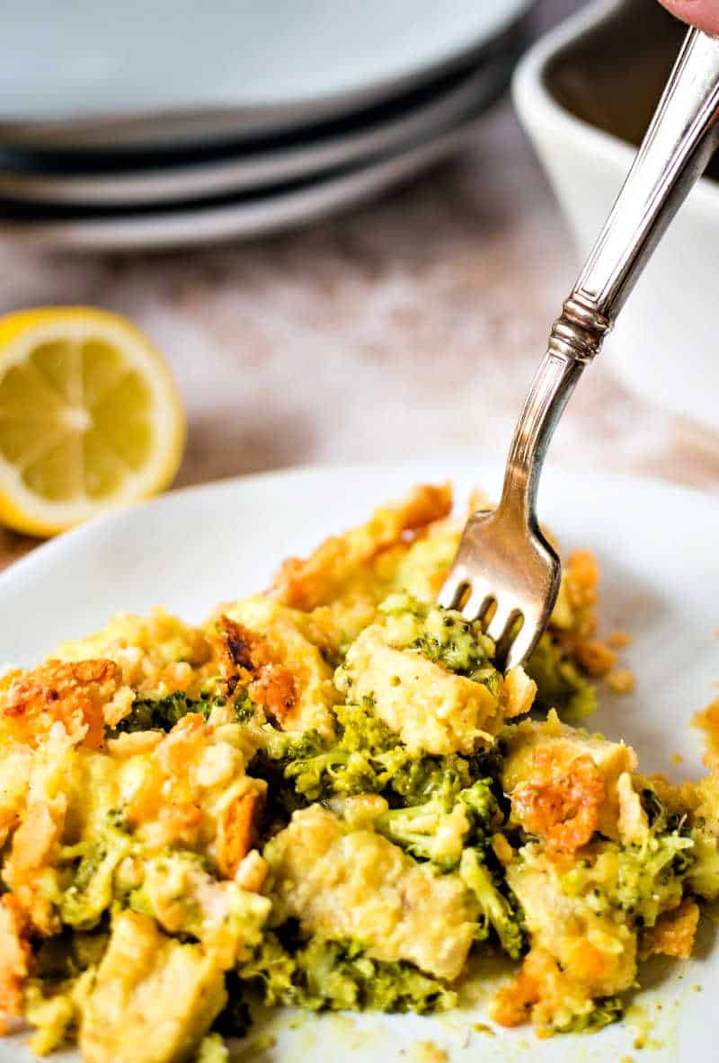 a fork spearing a bite of chicken curry broccoli casserole