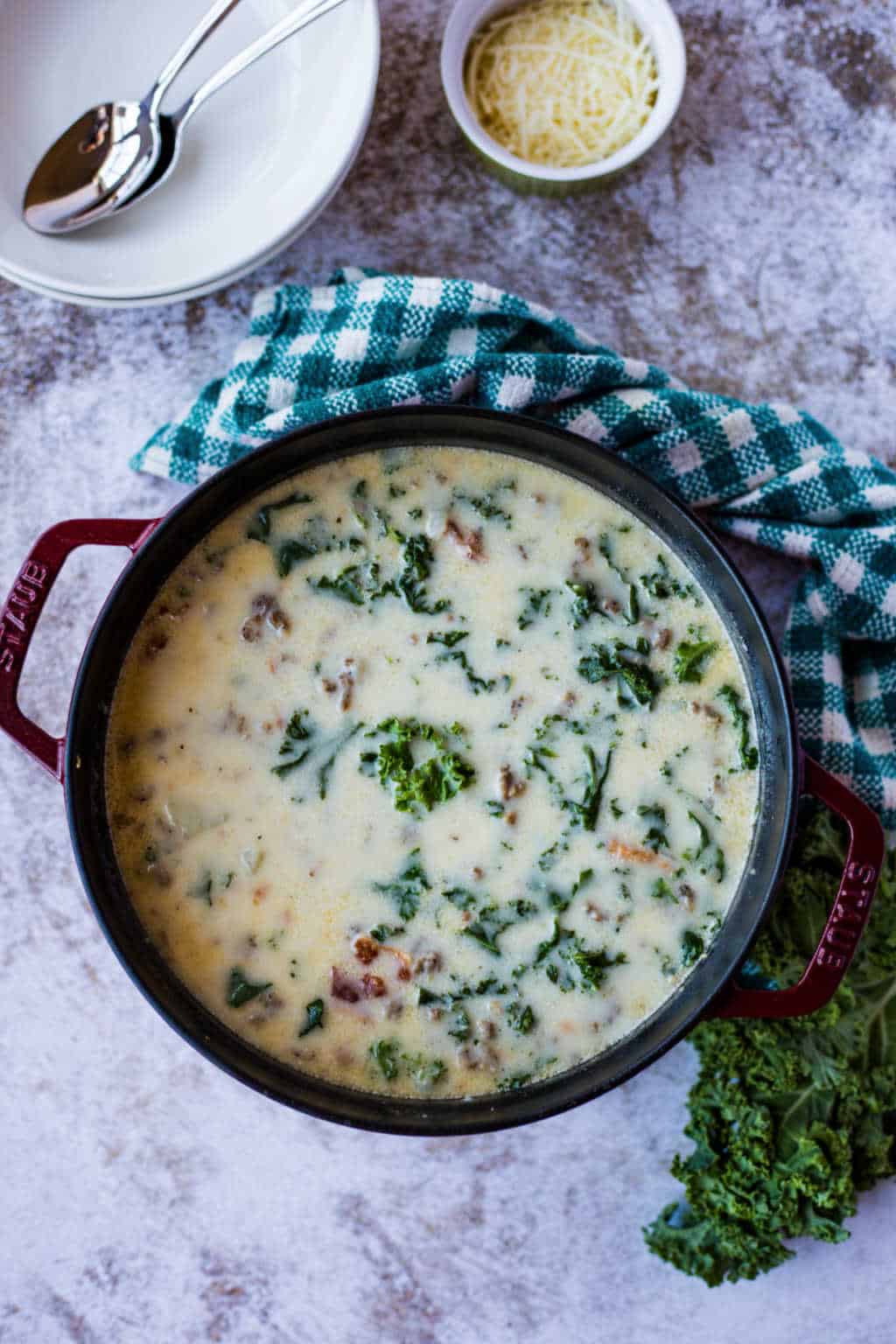 a pot of Olive Garden Zuppa Toscana Soup on a table