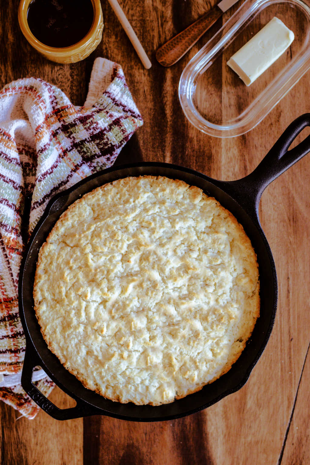 Biscuit Bread in a cast iron skillet on a wooden table