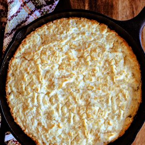 Biscuit Bread in a cast iron skillet on a wooden table