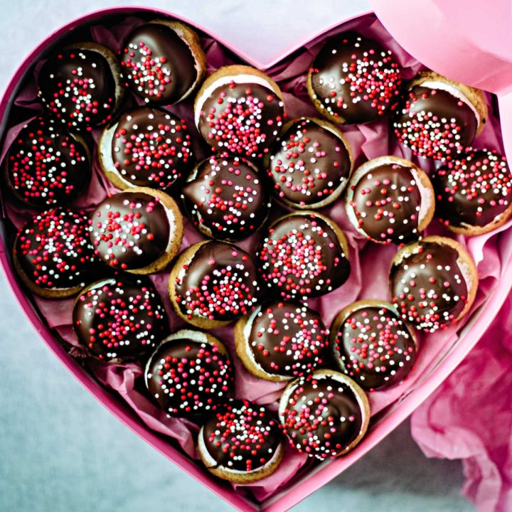 chocolate marshmallow cookies in a pink heart shaped box