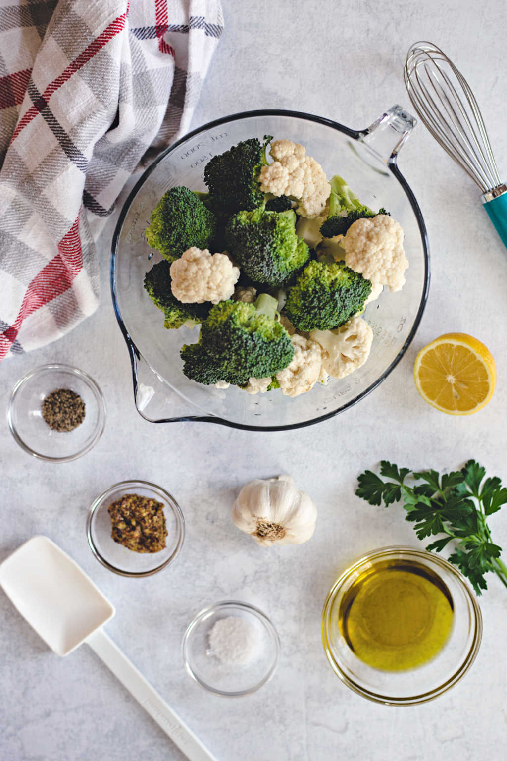 ingredients for roasted broccoli and cauliflower on a table