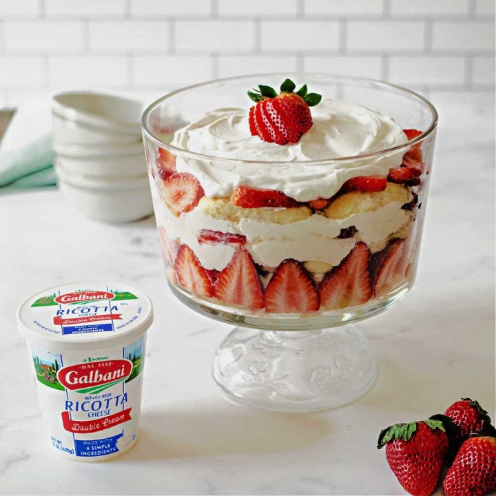 a strawberry trifle on a kitchen counter.