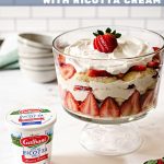 a strawberry trifle on a kitchen counter.
