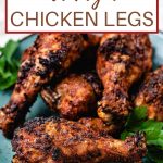 Air Fryer Chicken Legs on a white plate.