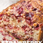 Strawberry Bread loaf on a white plate.