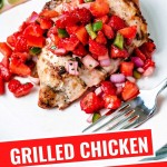 GRILLED CHICKEN BREAST WITH STRAWBERRY SALSA ON A WHITE PLATE.