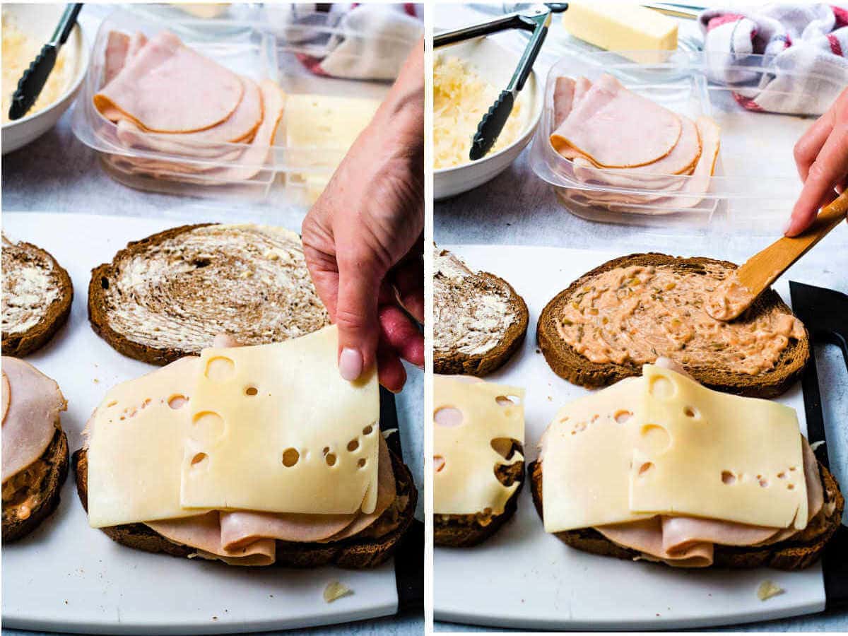 process steps for building a turkey reuben sandwich: spread bread with 1000 island dressing; add sauerkraut; layer turkey and swiss cheese; spread bread with 1000 island dressing.