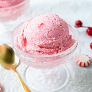 peppermint ice cream in a vintage cut glass ice cream bowl on a table.