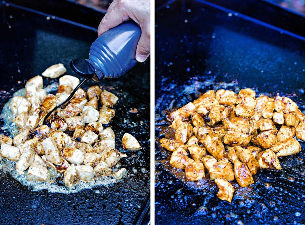 preparing hibachi chicken on a blackstone griddle and adding soy sauce from a squirt bottle.