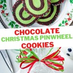 chocolate Christmas pinwheel cookies stacked on a Christmas plate setting on a table.