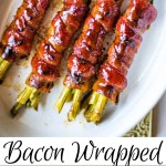 Bacon Wrapped Asparagus in a white serving dish.