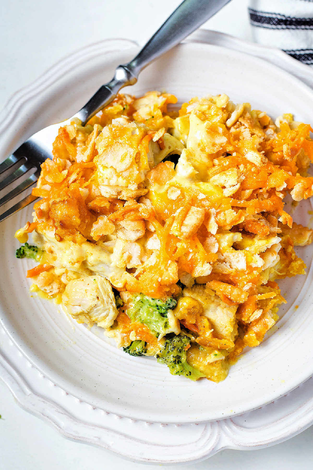 a serving of chicken broccoli casserole on a plate.