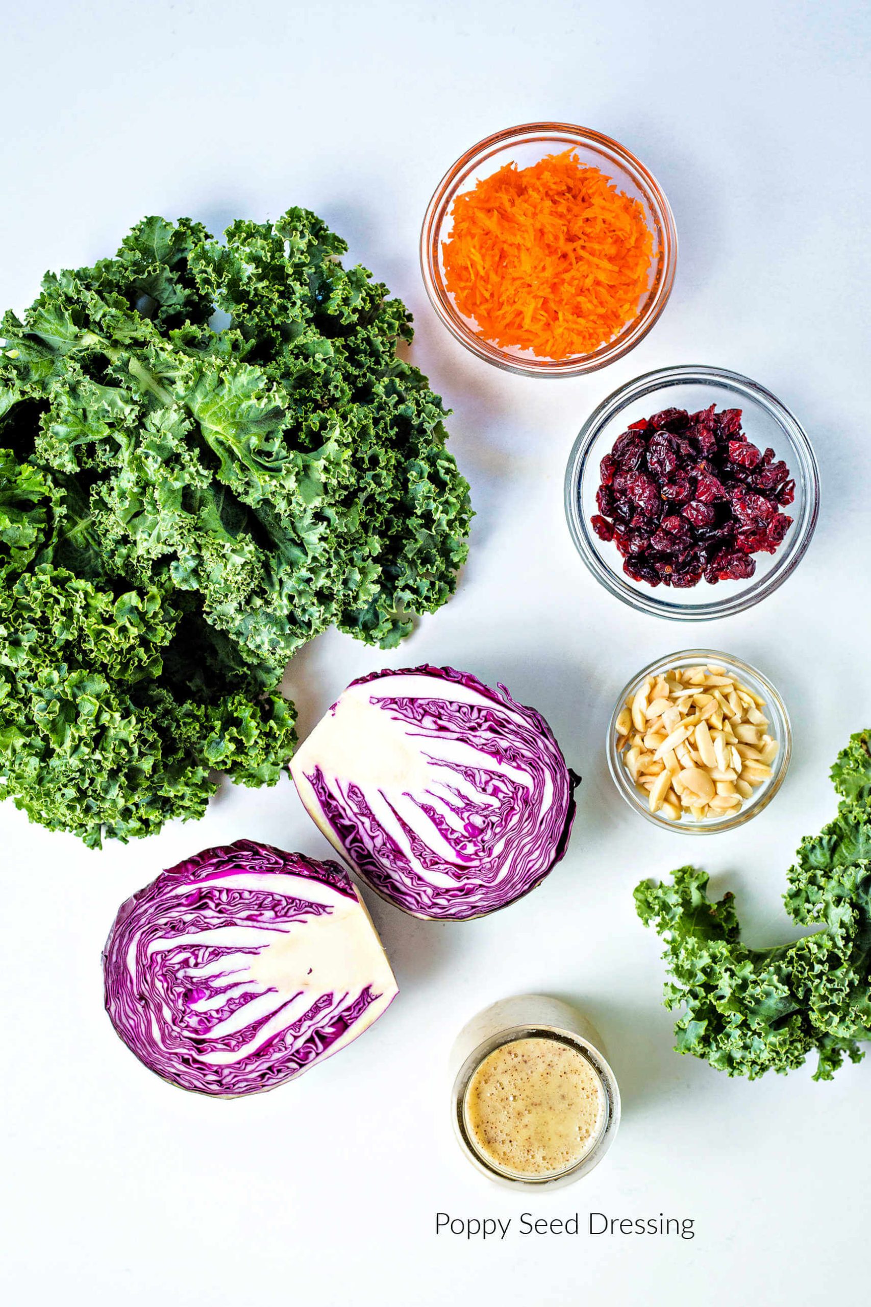 ingredients for kale slaw on a table.