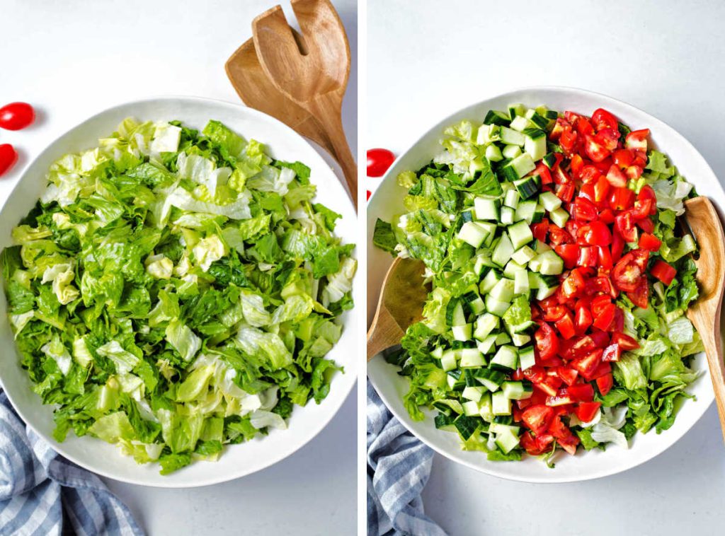 a bowl of lettuce and chopped tomatoes and cucumbers on a table.