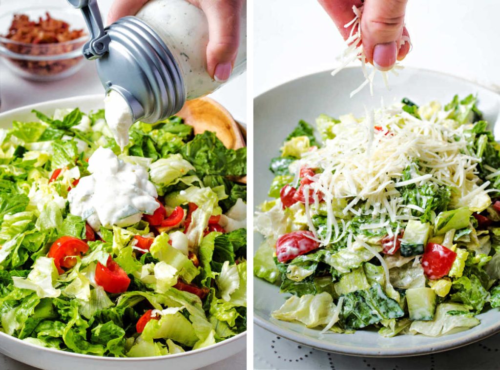 pouring parmesan dressing over a bowl of salad from a mason jar.