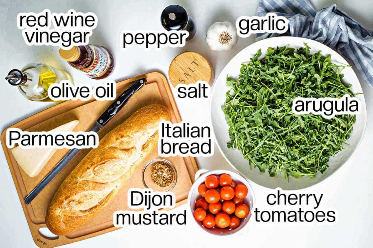 ingredients for grilled panzanella salad on a table.