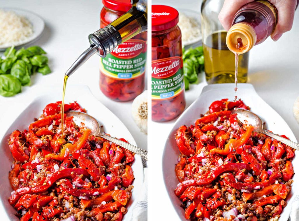 pouring olive oil over roasted red pepper strips in a white bowl.