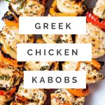 e skewers of Greek Chicken Kabobs on a white platter.