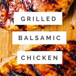Grilled Balsamic Chicken on a cutting board.