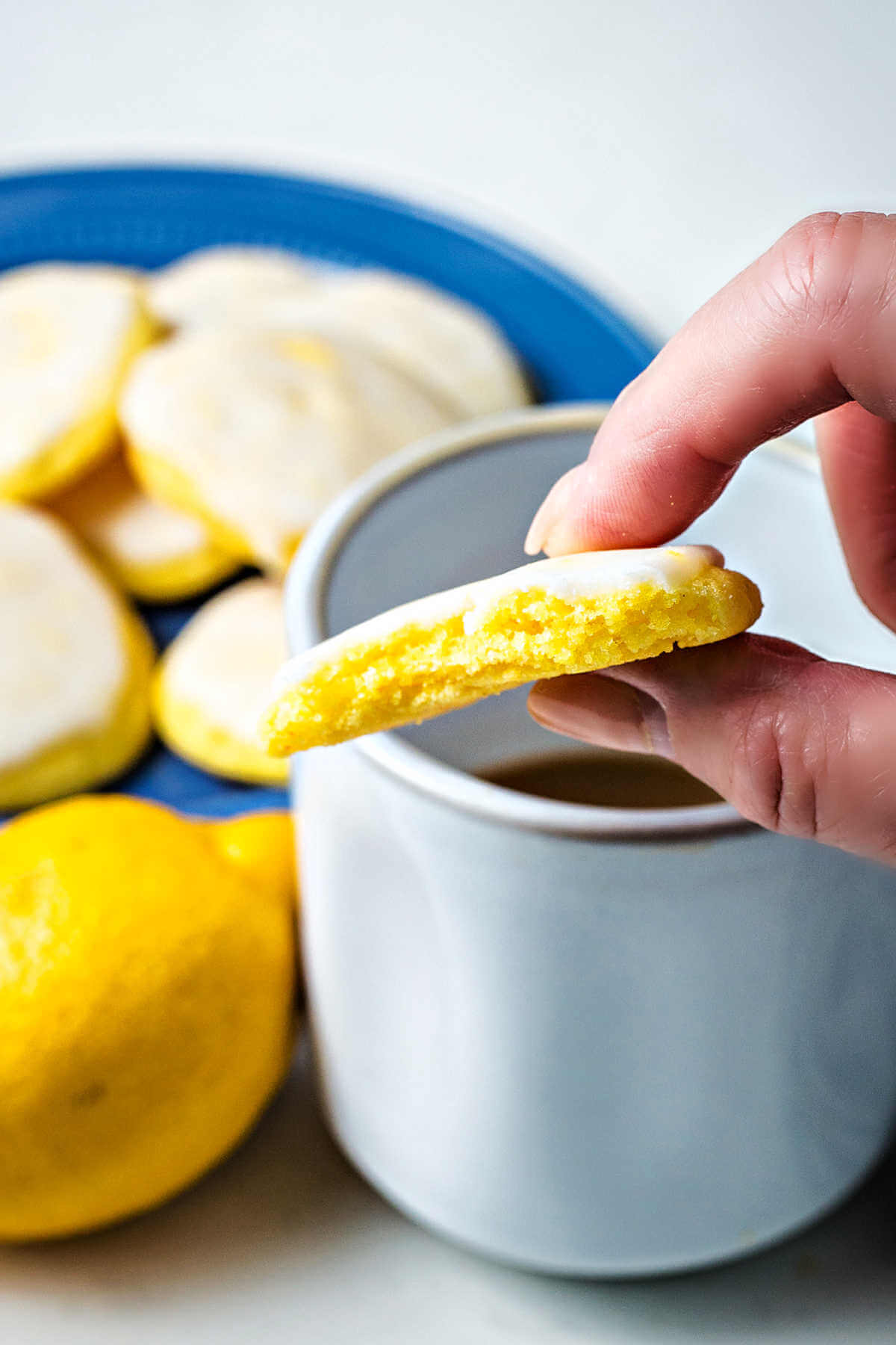 a lemon cake mix cookie with a bite missing.