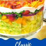 7-Layer Salad in a trifle dish.