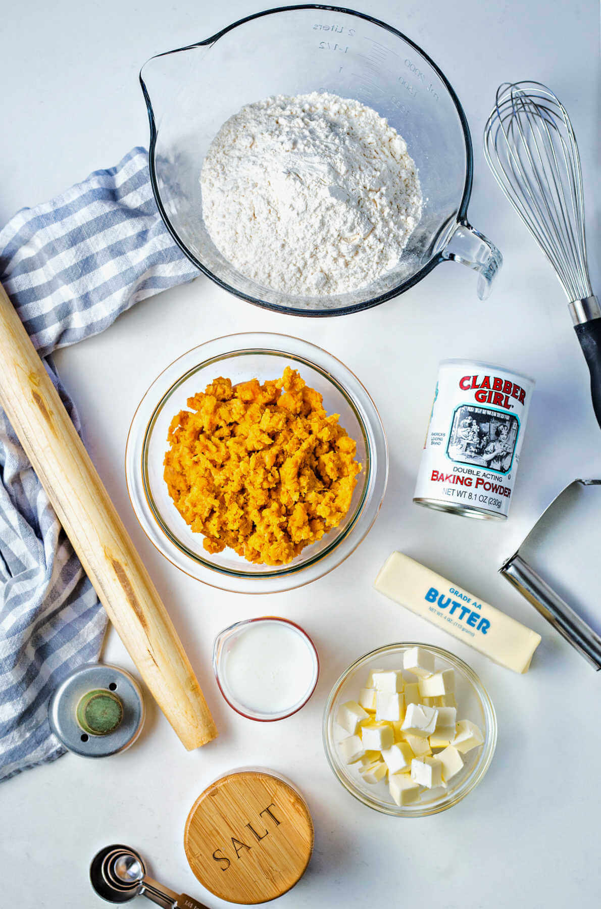 ingredients for sweet potato biscuits on a table.