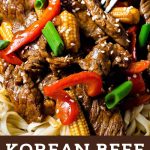 KOREAN BEEF STIR FRY OVER A BED OF LO MEIN NOODLES.