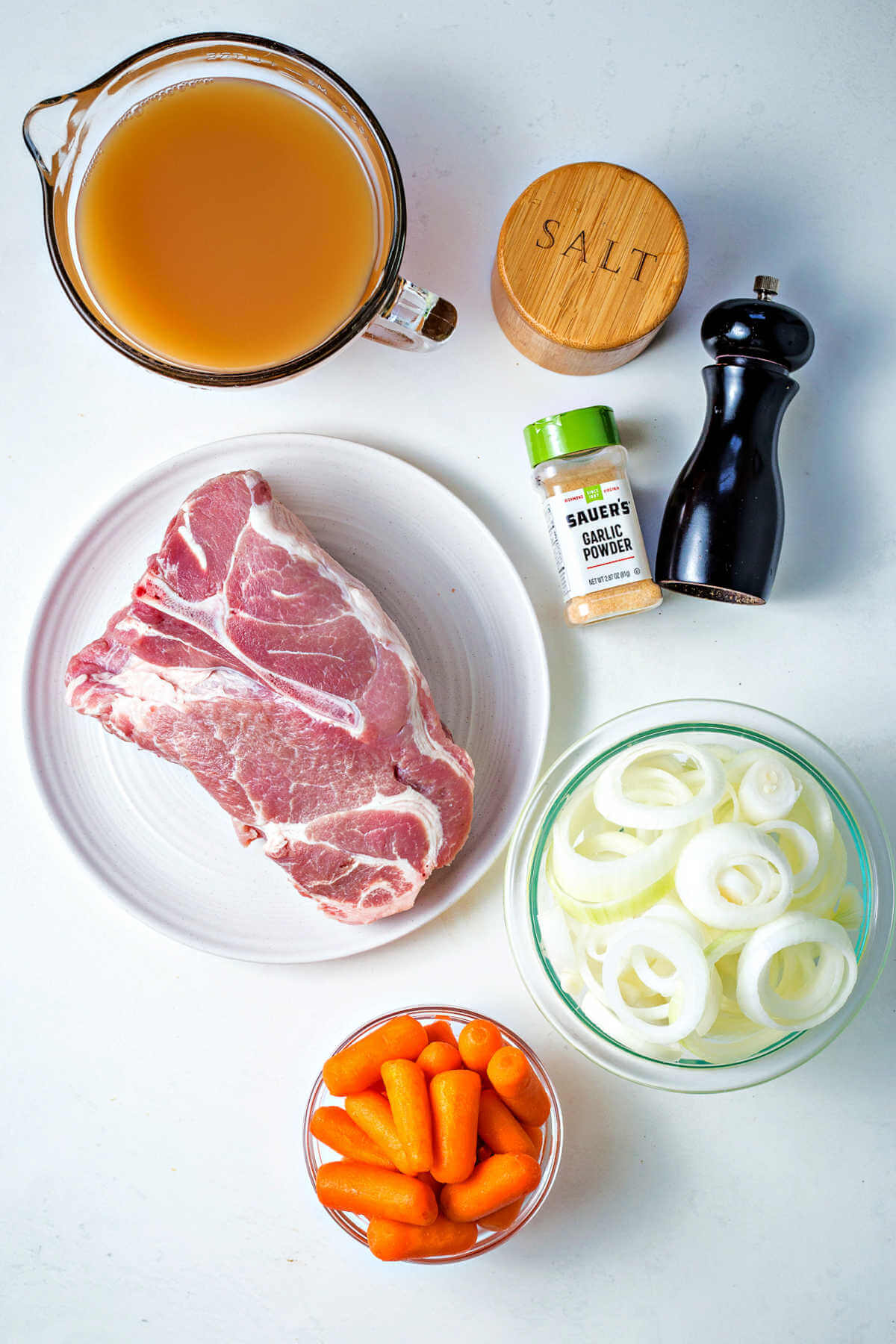 ingredients for slow cooker pork roast on a table.