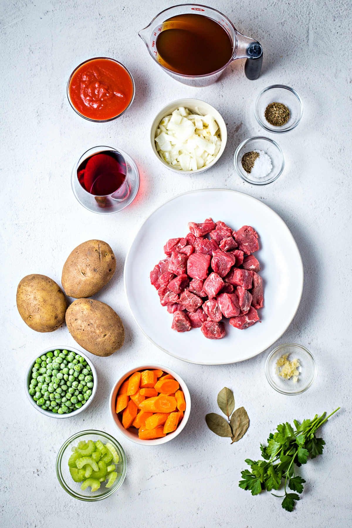 ingredients for instant pot beef stew on a table.