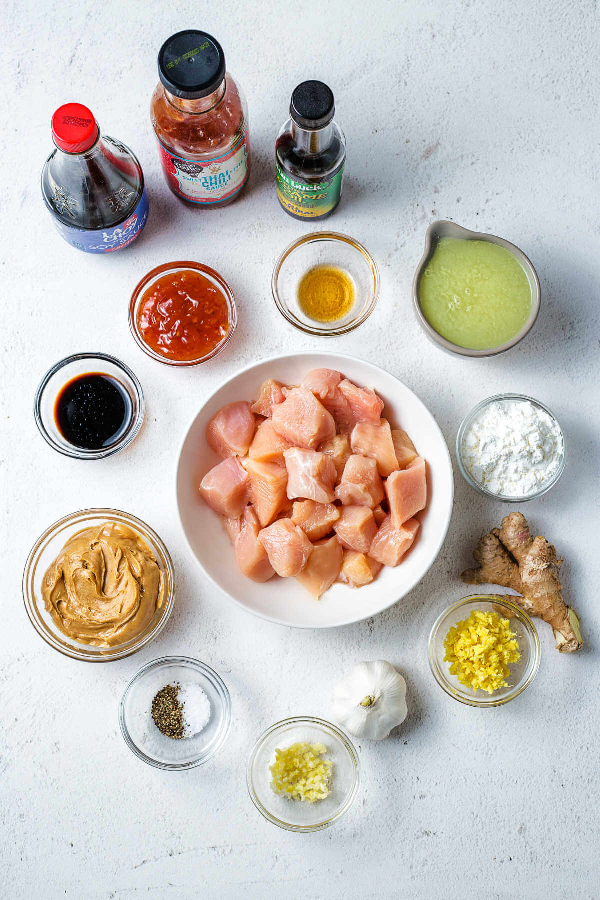 ingredients for peanut butter chicken on a table.