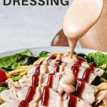 The Best Homemade BBQ Ranch Dressing drizzled over a salad.
