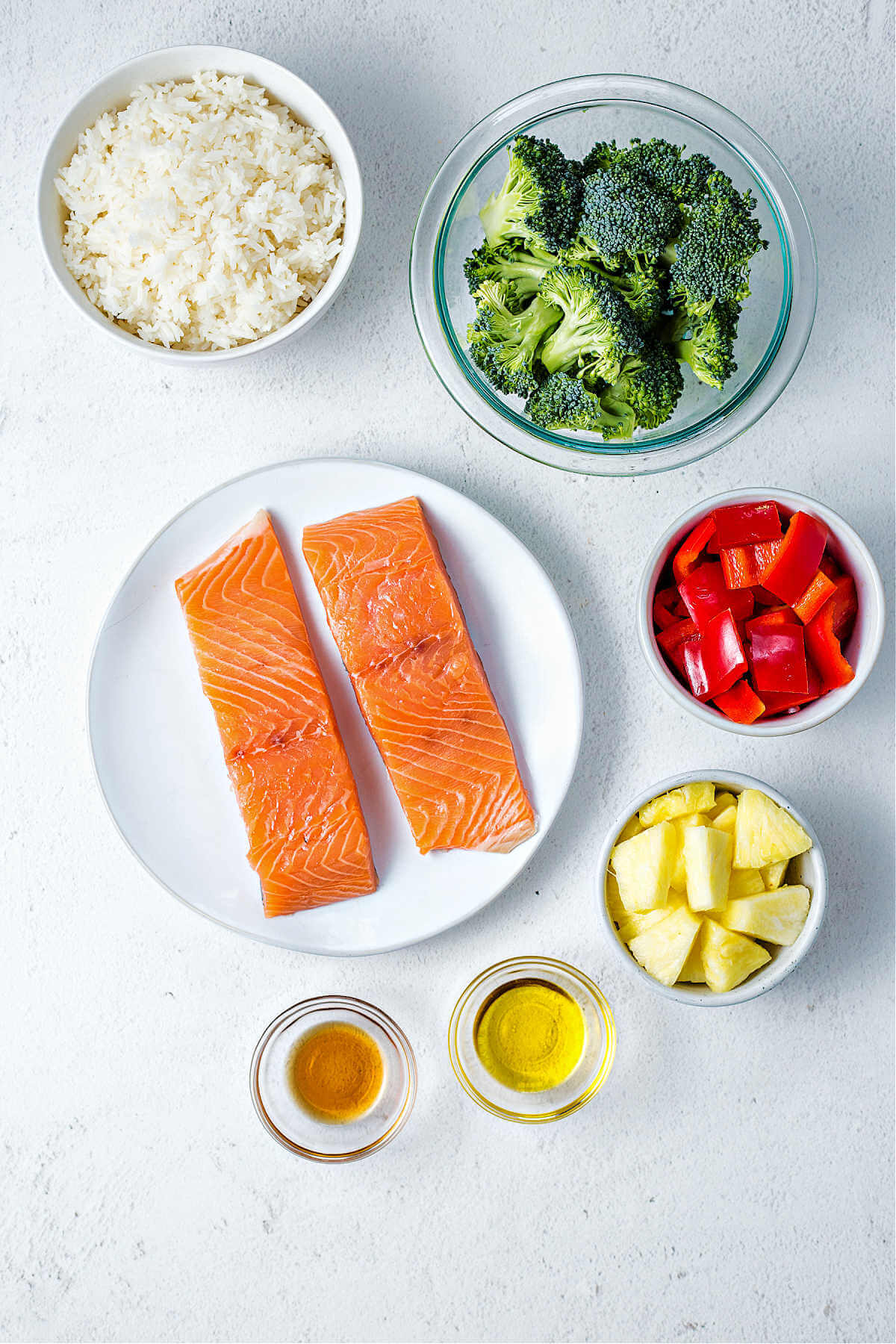 ingredients for salmon bowls on a table.