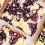 Blueberry Crumb Bars cut into squares.