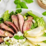 Grilled Steak Salad on a white platter.