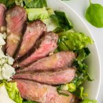 Grilled Steak Salad on a white platter.