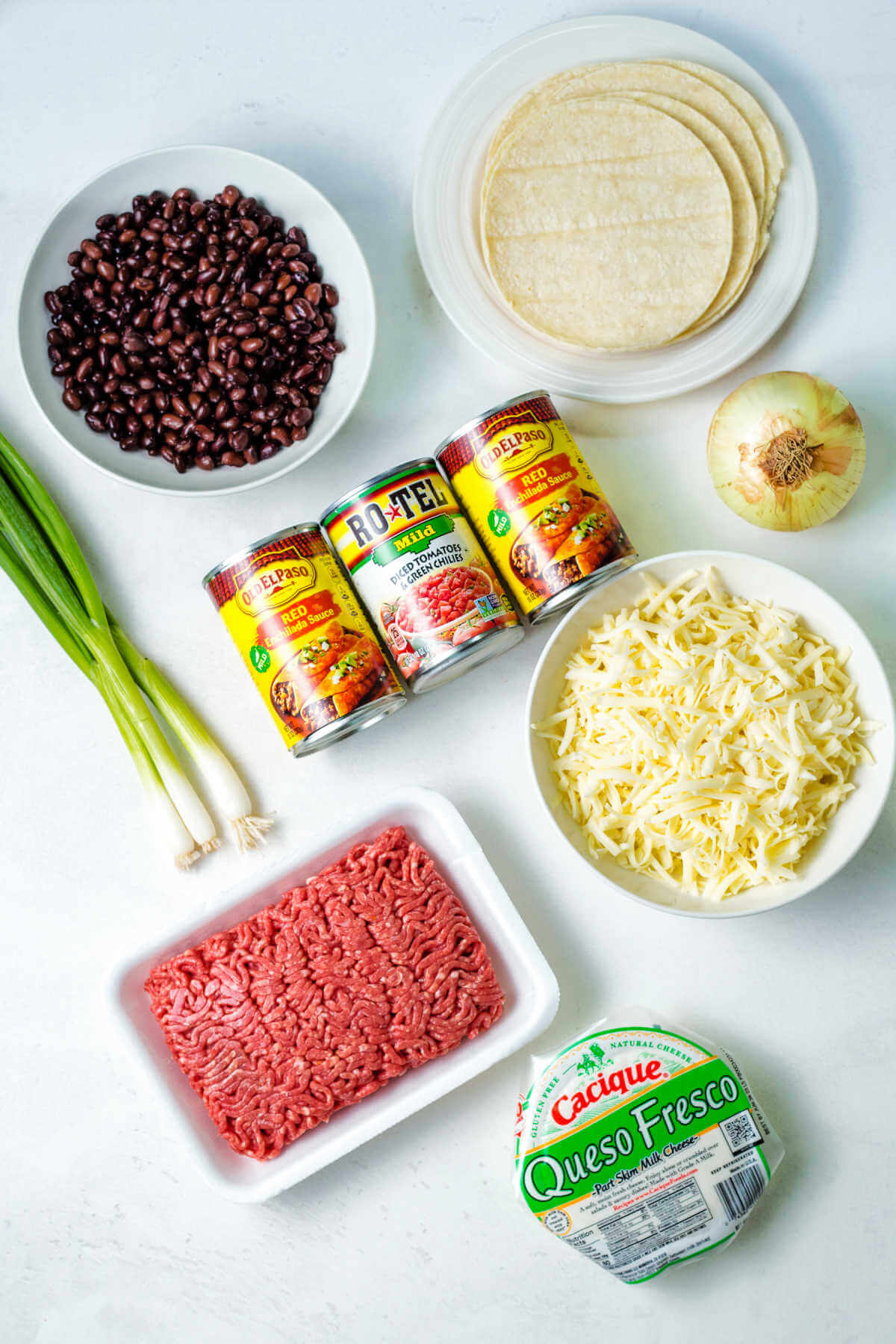 ingredients for beef enchilada skillet casserole on a table.