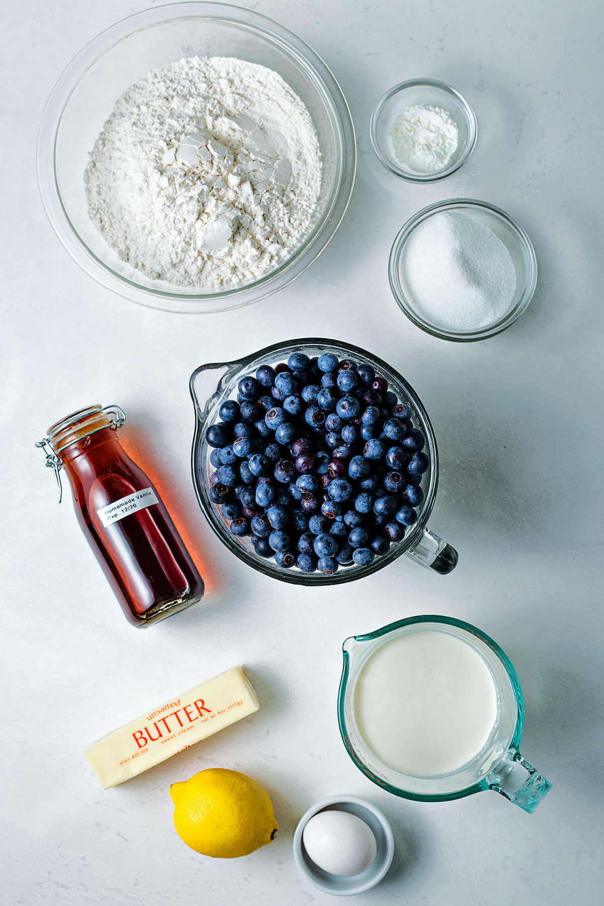 ingredients for blueberry shortcakes on a table.